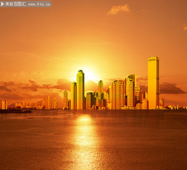 夕阳下的城市背景图片
