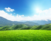 蓝天下草地山脉风景图片素材