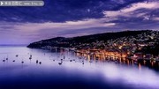 海边城市夜景摄影图片