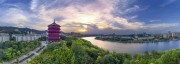 宽幅夕阳下的古塔新韵城市风光摄影图片