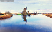 河流边的风车景色素材图片