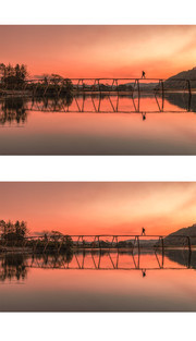 夕阳河流人字桥景观图片
